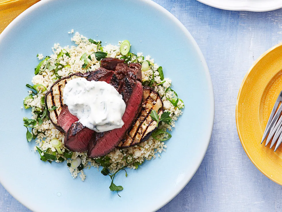 Steak with eggplant, couscous and cumin yoghurt