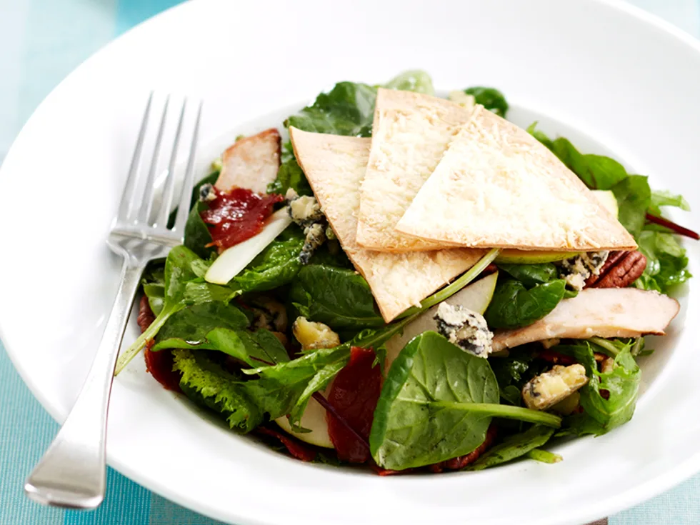 tortilla crisps with pear and smoked chicken salad