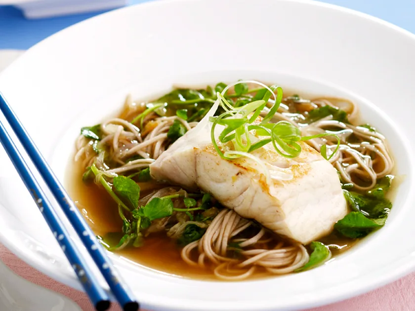 Watercress soba noodle soup with pan-fried fish