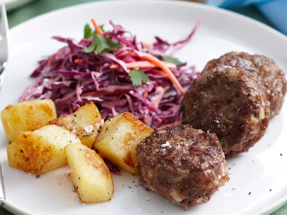 Beef rissoles with potatoes and coleslaw