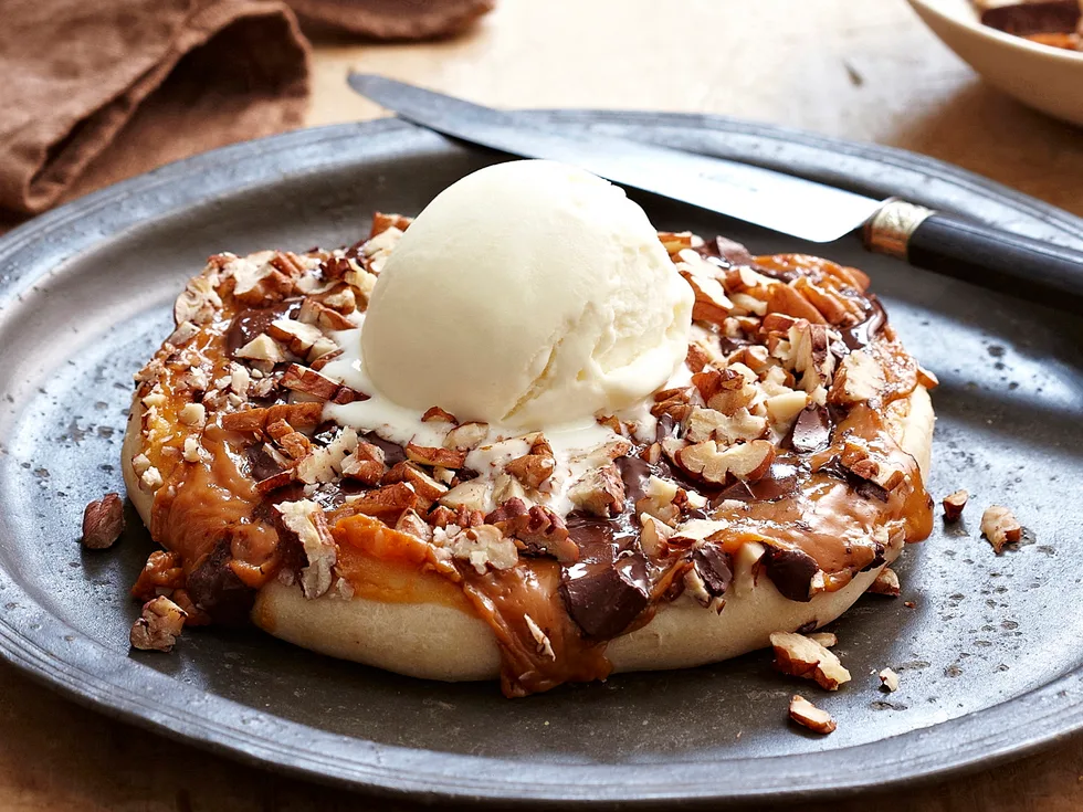 caramel, chocolate and pecan dessert pizza