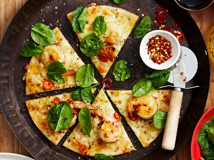 Chilli prawn and spinach pizzas