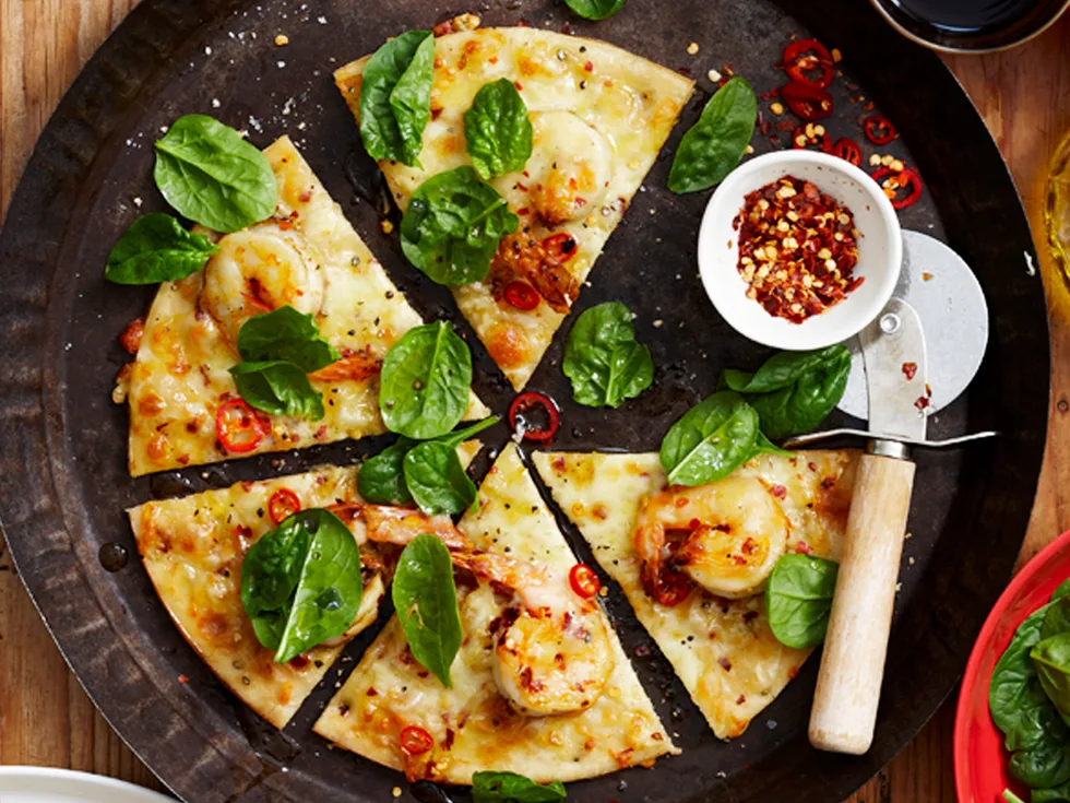 Chilli prawn and spinach pizzas