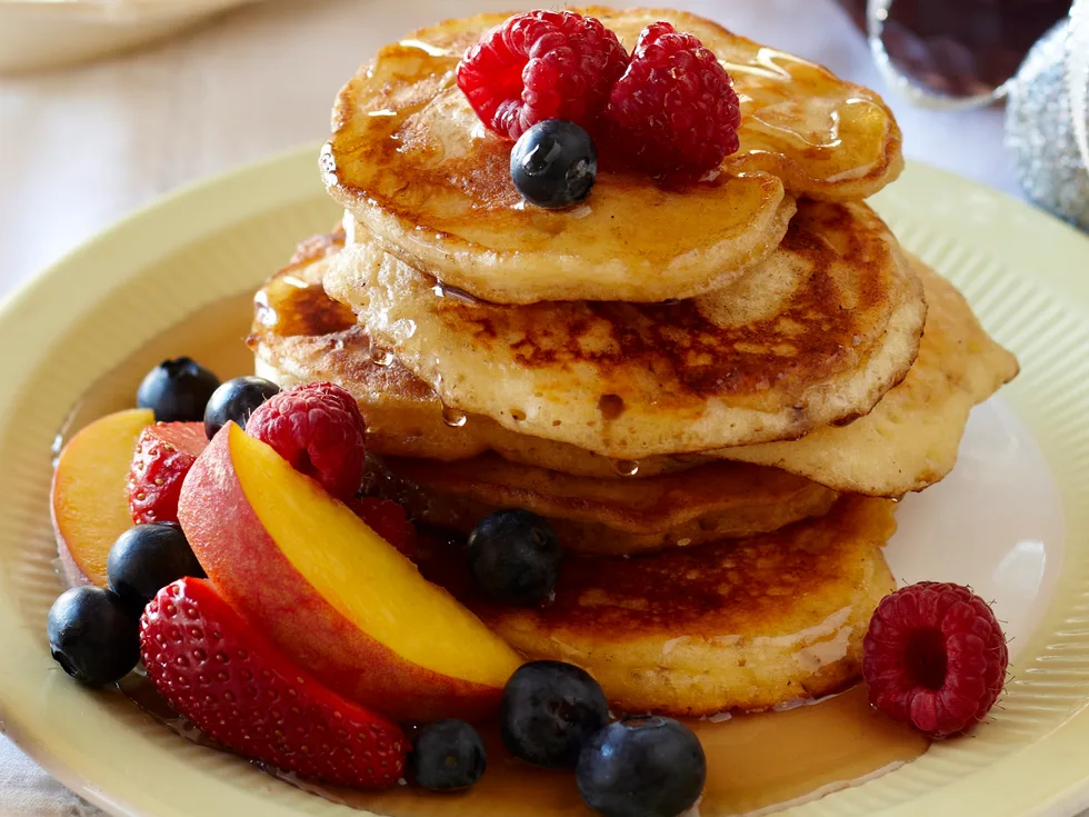 Fluffy pancakes with maple fruits