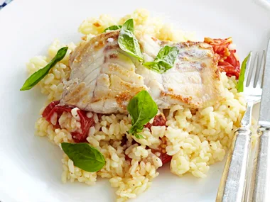 Lemon fish with tomato risotto