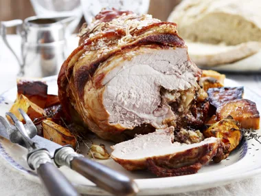 Roast pork with macadamia stuffing and cider gravy