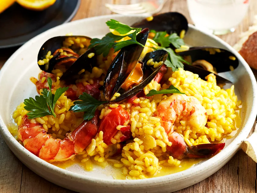 Seafood risotto flavoured with white wine and saffron recipe