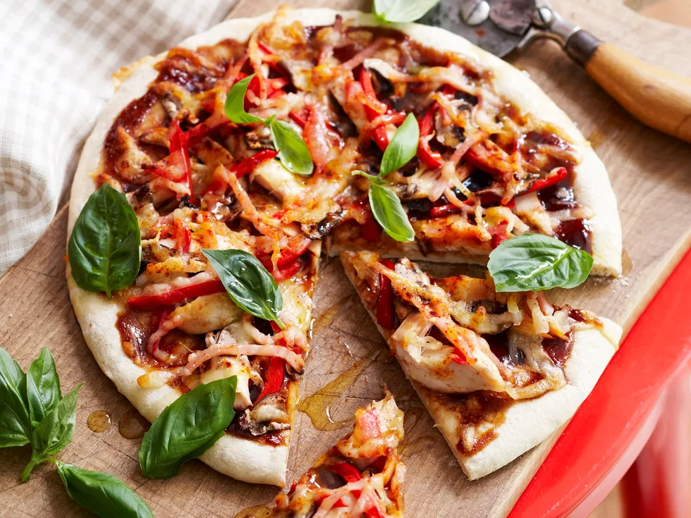 Smoky barbecued chicken pizzas