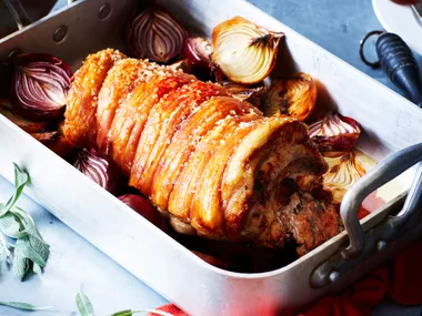 Stuffed pork shoulder with onions