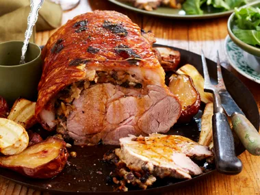 Stuffed roast pork neck, pears and parsnip