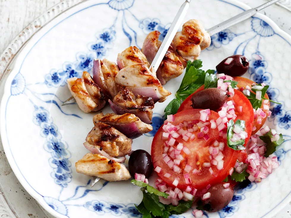 Tapas skewers and tomato salad