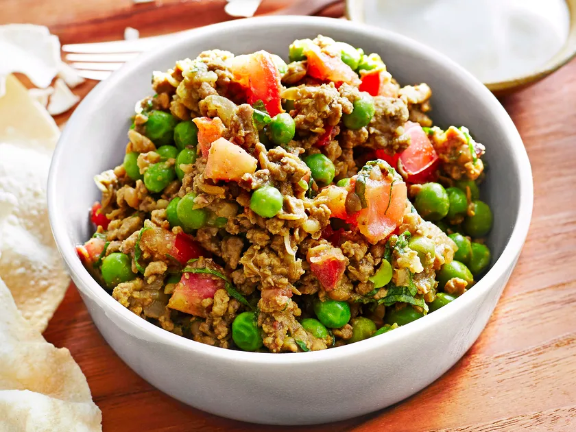 Curried lamb with peas and mint