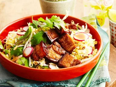 Twice-cooked, sticky pork belly salad