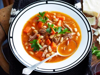 Veal shank and vegetable soup