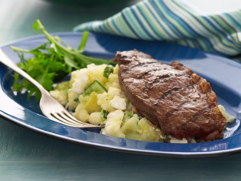 Chargrilled rump steak with potato and feta mash recipe