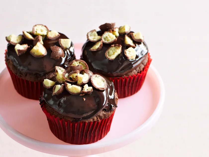 Chocolate cupcakes with ganache and maltesers