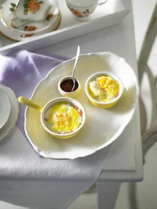 Baked eggs with ham and cheese