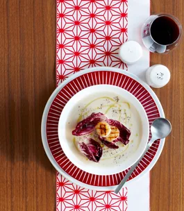Potato and artichoke soup with seared scallops