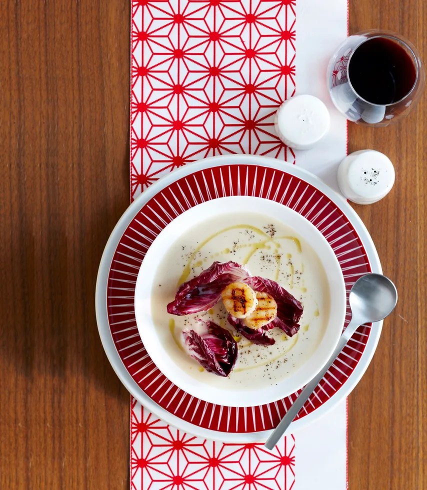 Potato and artichoke soup with seared scallops