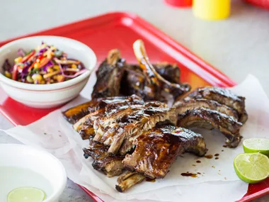 Sticky bourbon barbecue ribs with corn salad