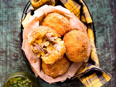 Lamb and pumpkin arancini balls with dijon salsa verde