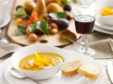 Kumara and ginger spiced soup with kumara chips