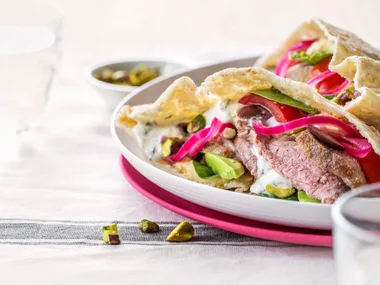 Greek lamb pitas with minted yoghurt sauce