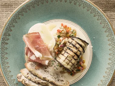 Grilled eggplant rolls with gorgonzola and basil stuffing