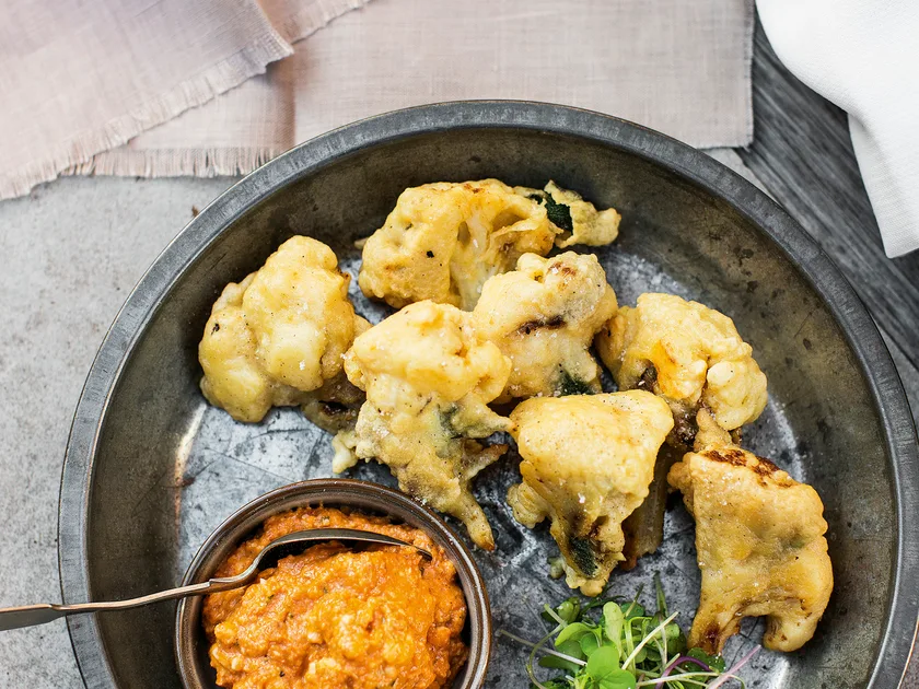Basil almond dip with anchovy and cauliflower fritters recipe