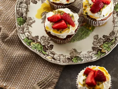 Almond butter cakes with whipped coconut and passionfruit icing