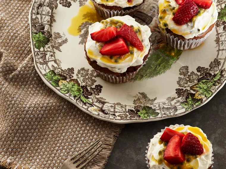 Almond butter cakes with whipped coconut and passionfruit icing