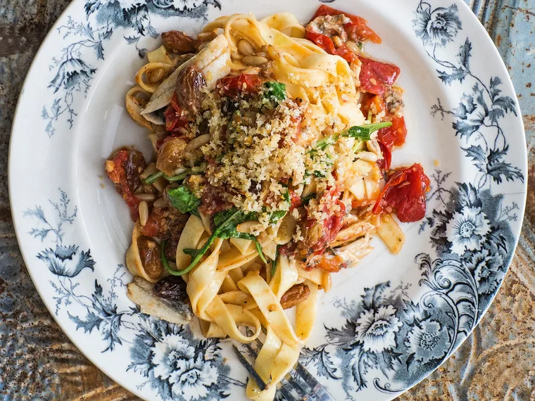Tagliatelle with vine tomatoes, white anchovies and breadcrumbs