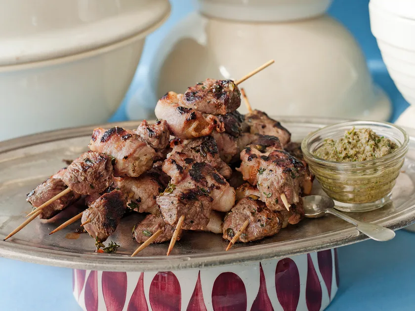 Lamb and crusty bacon skewers with caper salsa