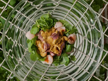 Pan-fried pork scotch fillet with spicy coconut masala and lychees