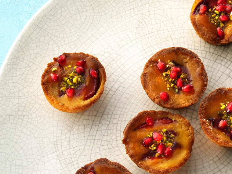 Nectarine frangipane cakes with apricot glaze and pistachios
