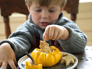 Whole roasted pumpkin soup with leaf dippers