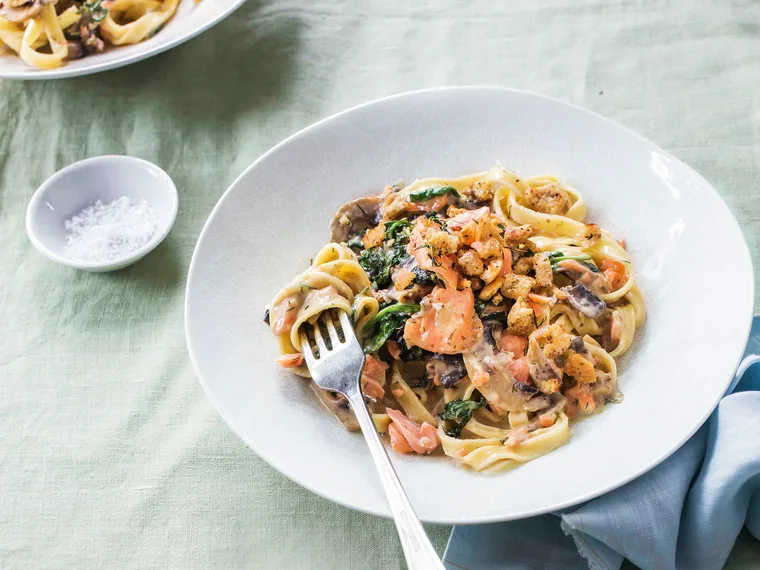 Creamy salmon and mushroom fettuccine with garlic crumbs