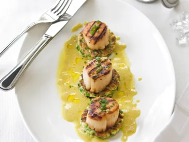 Pea and watercress fritters with scallops and curry sauce