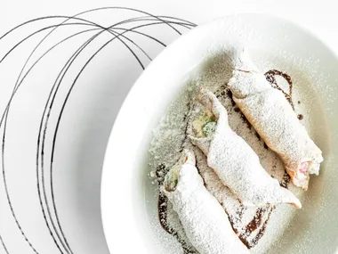 Sicilian-style cannoli with sweet ricotta, chocolate and candied fruit
