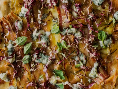 White pizza with roast garlic paste and flat pancetta