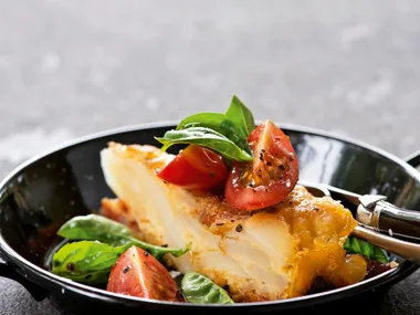 Chorizo and manchego tortilla with tomato and basil salad