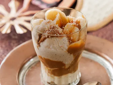 Dulce de leche with bananas, ice-cream and toasted coconut