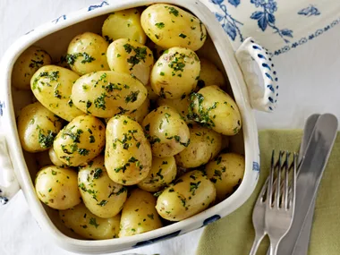 Boiled new potatoes with minty herb butter