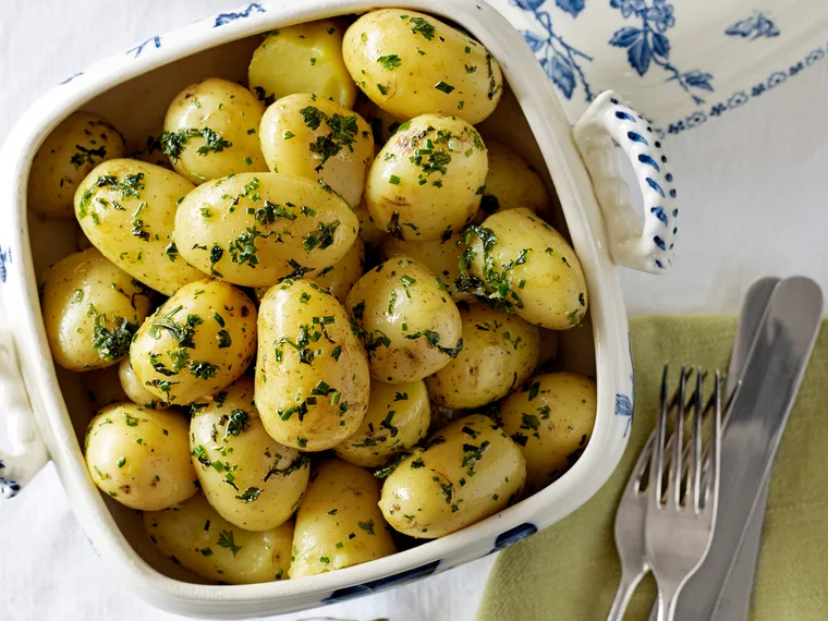 Boiled new potatoes with minty herb butter
