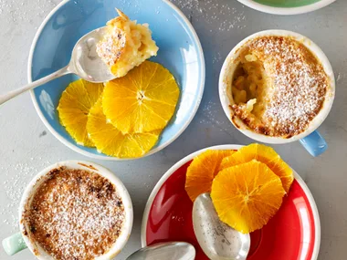 Brûlée-topped creamy rice pots with cointreau oranges