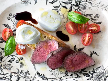 Rare beef tenderloin with caprese salad