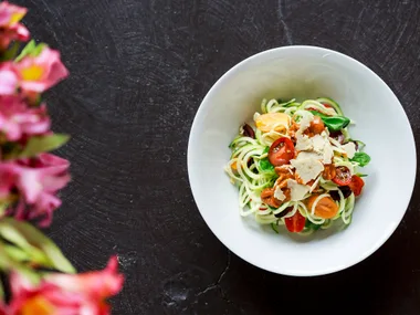 Zucchini pasta with fresh basil and cherry tomatoes