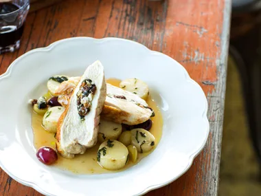 Ricotta and spinach-stuffed chicken with Galliano vanilla grapes