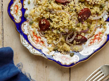 Millet couscous with red onion, capers, lemon and chorizo