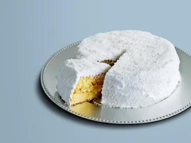 Coconut layer cake with lime and pineapple filling